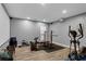 Basement featuring home gym equipment and a projector screen at 935 Grove Valley Drive Dr, Cumming, GA 30041