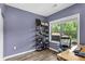 Bedroom with ample natural light and a view of the backyard at 935 Grove Valley Drive Dr, Cumming, GA 30041