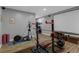 Spacious home gym featuring an elliptical machine, free weights and tv at 935 Grove Valley Drive Dr, Cumming, GA 30041
