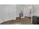 Hallway displaying hard surface floors and white doors at 935 Grove Valley Drive Dr, Cumming, GA 30041