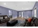 Spacious living room with comfortable seating, wood flooring and natural light at 935 Grove Valley Drive Dr, Cumming, GA 30041