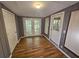 Bright and airy sun room with hardwood floors, and an exterior patio at 1150 Goldsmith Rd, Stone Mountain, GA 30083