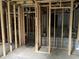 Unfinished basement with exposed wood beams and framing ready for customization at 2039 Harwinor Se Rd, Smyrna, GA 30082