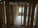 This is an unfinished room with exposed framing and a doorway at 2039 Harwinor Se Rd, Smyrna, GA 30082