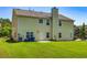 Large backyard with lush green lawn, perfect for recreation and relaxation at 2689 Muskeg Sw Ct, Atlanta, GA 30331