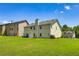 Large backyard with a lush green lawn, perfect for outdoor activities at 2689 Muskeg Sw Ct, Atlanta, GA 30331