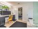 Bathroom features a vanity with drawers, a glass shower door, and tan tiled floors at 2689 Muskeg Sw Ct, Atlanta, GA 30331
