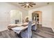 Elegant dining room with stylish chandelier and wainscoting, plus seating for six for elegant dinner parties at 2689 Muskeg Sw Ct, Atlanta, GA 30331