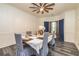 Bright dining room with modern chandelier, wainscoting, and seating for six, perfect for Gathering dinners at 2689 Muskeg Sw Ct, Atlanta, GA 30331