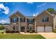 Beautiful two-story brick home with a two-car garage, manicured lawn and classic curb appeal at 2689 Muskeg Sw Ct, Atlanta, GA 30331