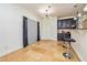 Kitchen with dark cabinets, granite countertops, stainless steel appliances, travertine floors and bar stool seating at 2689 Muskeg Sw Ct, Atlanta, GA 30331
