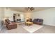 Inviting living room features comfortable seating, neutral decor, and archway views of other rooms in the house at 2689 Muskeg Sw Ct, Atlanta, GA 30331
