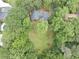 Aerial view of the property featuring lush trees, private lot, and cozy home at 2755 Whitehurst Ne Dr, Marietta, GA 30062