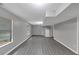 Finished basement with recessed lighting and vinyl flooring at 2755 Whitehurst Ne Dr, Marietta, GA 30062