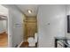 Bathroom featuring a tiled shower, vanity sink, and wood-look floors at 2755 Whitehurst Ne Dr, Marietta, GA 30062