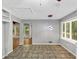 Open-concept kitchen/dining area with tile floors, natural lighting, and a view into a room with hardwood floors at 2755 Whitehurst Ne Dr, Marietta, GA 30062