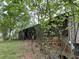 View of the home's brick exterior and backyard landscaping at 2831 Bettis Ct, Marietta, GA 30066
