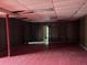 Unfinished basement with wood paneling and a dropped ceiling at 2831 Bettis Ct, Marietta, GA 30066