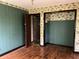 Bedroom with open closet and wallpaper at 2831 Bettis Ct, Marietta, GA 30066