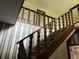 Wooden staircase with carpeted steps and patterned wallpaper at 2831 Bettis Ct, Marietta, GA 30066
