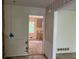 Hallway leading to gutted kitchen with light and neutral color walls at 3511 Brookview Dr, Marietta, GA 30068