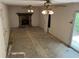 Living room featuring a stone fireplace, fan, and sliding glass doors at 3511 Brookview Dr, Marietta, GA 30068