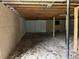 Unfinished basement with exposed beams and block wall foundation at 644 Cambridge Dr, Marietta, GA 30066