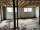 Basement featuring support beams and windows at 644 Cambridge Dr, Marietta, GA 30066
