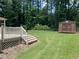 Backyard featuring a shed and a large lawn at 6512 Executive Dr, Winston, GA 30187