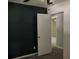 Bedroom featuring a decorative accent wall and standard closet door at 6512 Executive Dr, Winston, GA 30187