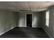 Finished basement with a window, neutral walls, and easy access to other areas via a door at 730 Redlion Run, Alpharetta, GA 30022