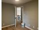 Bedroom with doorway to a staircase featuring decorative iron railings at 730 Redlion Run, Alpharetta, GA 30022