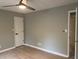 Bedroom featuring hardwood floors, a ceiling fan, and neutral paint at 730 Redlion Run, Alpharetta, GA 30022