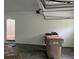 Spacious two car garage with access door and white walls that's great for storage at 730 Redlion Run, Alpharetta, GA 30022