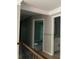 Hallway with white trim and doors providing access to other rooms within the home at 730 Redlion Run, Alpharetta, GA 30022
