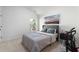 Neutral bedroom with a comfortable bed, soft carpet, and abundant natural light at 2040 Harvest Ridge Cir, Buford, GA 30519