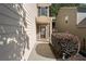 Inviting home entrance with stone accents, a welcoming wreath, and manicured landscaping at 2040 Harvest Ridge Cir, Buford, GA 30519
