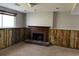 Unfinished basement with brick fireplace and exposed insulation awaiting customization to suit your lifestyle at 2317 Wilkins Ct, Decatur, GA 30035