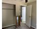 This bedroom needs some love as indicated by an open door and missing drywall at 2317 Wilkins Ct, Decatur, GA 30035