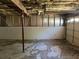 Spacious garage area with exposed ceiling beams, providing ample space for parking and storage at 2317 Wilkins Ct, Decatur, GA 30035