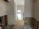 A kitchen needing renovation and remodeling with a view to the foyer at 2317 Wilkins Ct, Decatur, GA 30035