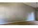 Empty living room with high ceilings ready for renovation at 2317 Wilkins Ct, Decatur, GA 30035