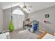 Bright ' bedroom with a bunk bed, vaulted ceilings, playful decor, and a unique hanging chair at 2780 Matlin Way, Buford, GA 30519