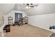 Open bedroom area showcasing neutral walls, carpeting, and a charming ceiling fan at 2780 Matlin Way, Buford, GA 30519