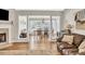 Inviting living room with hardwood floors, fireplace and an open flow to the dining area at 2780 Matlin Way, Buford, GA 30519