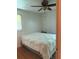 Bedroom features a ceiling fan, window with blinds and a neatly made bed at 309 E Rhinehill E Rd, Atlanta, GA 30315