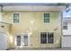 Backyard featuring patio and home exterior at 6073 Camden Forrest Dr, Riverdale, GA 30296