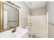 Bathroom featuring a large mirror and shower-tub combination at 6073 Camden Forrest Dr, Riverdale, GA 30296