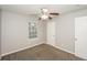Bedroom featuring neutral walls, carpet, and a window at 6073 Camden Forrest Dr, Riverdale, GA 30296