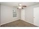 Bedroom with natural light and carpet flooring at 6073 Camden Forrest Dr, Riverdale, GA 30296